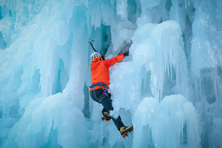 Man climbing an 	ice wall